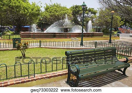 Empty bench in a plaza, Loiza, Puerto Rico View Large Photo Image Stock Image - Empty bench in a plaza, Loiza, Puerto Rico. Fotosearch