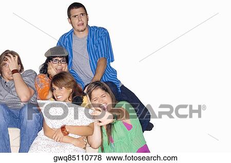 Five friends watching television View Large Photo Image Stock Photo - Five friends watching television. Fotosearch
