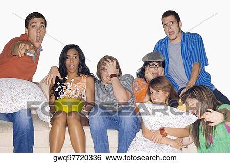 Group of friends watching television View Large Photo Image Stock Photograph - Group of friends watching television. Fotosearch