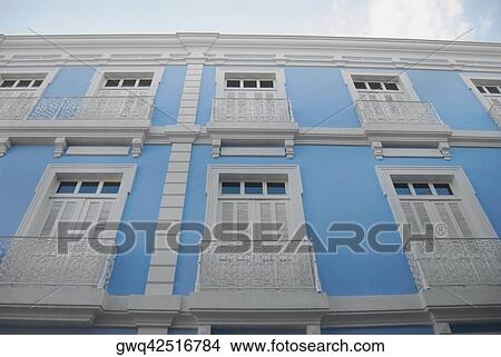 Picture - Low angle view of closed windows of a building. Fotosearch