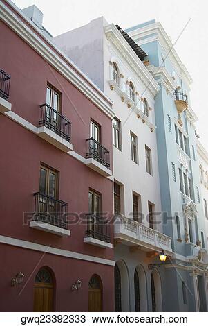 Low angle view of closed windows of buildings View Large Photo Image Stock Image - Low angle view of closed windows of buildings. Fotosearch