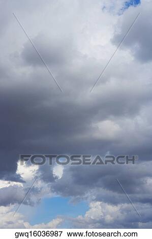 Low angle view of clouds View Large Photo Image Stock Photo - Low angle view of clouds. Fotosearch