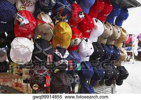 Multi-colored baseball caps at a market stall, Rio Piedras, San Juan, Puerto Rico View Large Photo Image Stock Photography - Multi-colored baseball caps at a market stall, Rio Piedras, San Juan, Puerto Rico. Fotosearch
