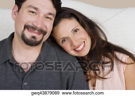 Portrait of a mid adult couple smiling View Large Photo Image Stock Photo - Portrait of a mid adult couple smiling. Fotosearch