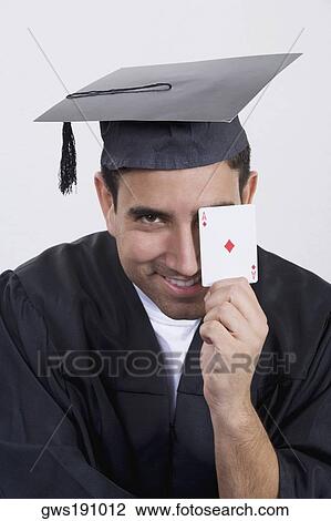 Portrait of a mid adult man holding an ace card and smiling View Large Photo Image Stock Image - Portrait of a mid adult man holding an ace card and smiling. Fotosearch