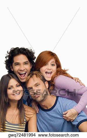 Portrait of a mid adult man smiling with his friends View Large Photo Image Picture - Portrait of a mid adult man smiling with his friends. Fotosearch