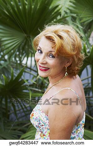 Stock Photo - Portrait of a senior woman smiling. Fotosearch
