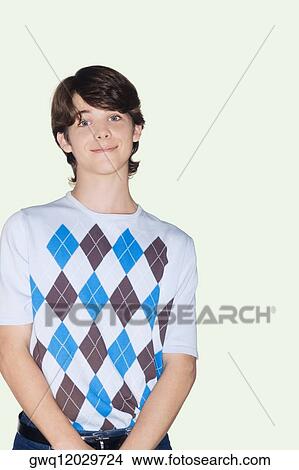 Portrait of a teenage boy smiling View Large Photo Image Picture - Portrait of a teenage boy smiling. Fotosearch