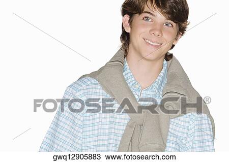 Stock Image - Portrait of a teenage boy smiling. Fotosearch