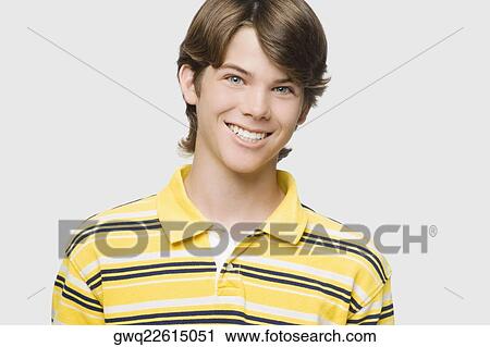 Stock Image - Portrait of a teenage boy smiling. Fotosearch