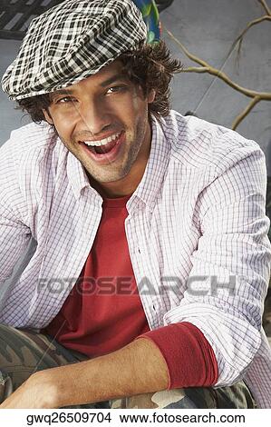 Portrait of a young man laughing View Large Photo Image Picture - Portrait of a young man laughing. Fotosearch