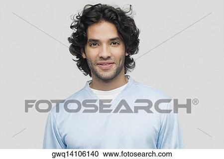 Portrait of a young man smiling View Large Photo Image Stock Image - Portrait of a young man smiling. Fotosearch