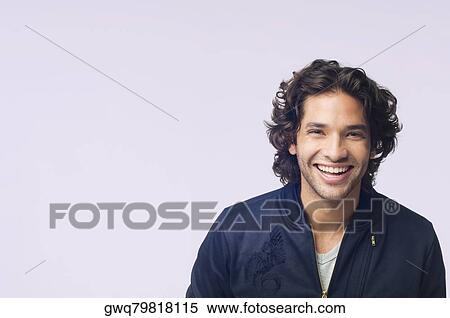 Portrait of a young man smiling View Large Photo Image Stock Photography - Portrait of a young man smiling. Fotosearch