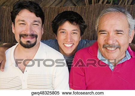 Portrait of a young man smiling with his father and grandfather View Large Photo Image Stock Photography - Portrait of a young man smiling with his father and grandfather. Fotosearch