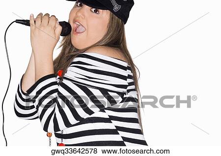 Portrait of a young woman singing View Large Photo Image Stock Photo - Portrait of a young woman singing. Fotosearch