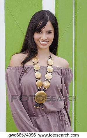 Stock Photograph - Portrait of a young woman smiling. Fotosearch