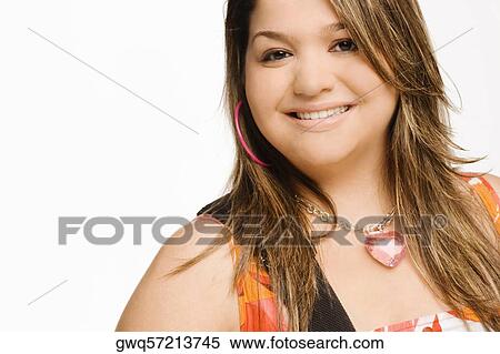 Portrait of a young woman smiling View Large Photo Image Stock Photography - Portrait of a young woman smiling. Fotosearch