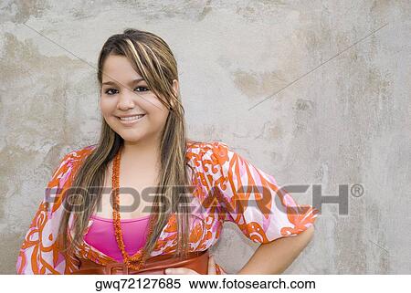 Portrait of a young woman smiling View Large Photo Image Stock Photography - Portrait of a young woman smiling. Fotosearch