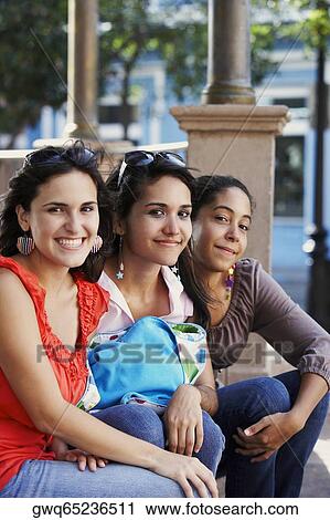 Portrait of three young women sitting and smiling, Old San Juan, San Juan, Puerto Rico View Large Photo Image Stock Image - Portrait of three young women sitting and smiling, Old San Juan, San Juan, Puerto Rico. Fotosearch