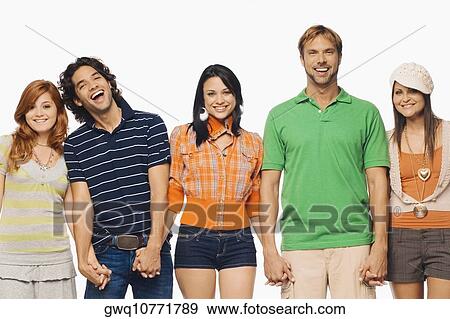 Portrait of two men and three young women standing with holding their hands View Large Photo Image Stock Photo - Portrait of two men and three young women standing with holding their hands. Fotosearch
