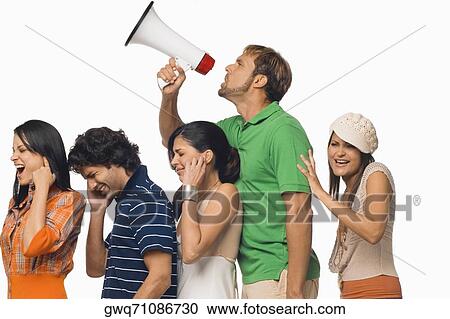 Side profile of a mid adult man shouting into a megaphone between his friends View Large Photo Image Stock Image - Side profile of a mid adult man shouting into a megaphone between his friends. Fotosearch