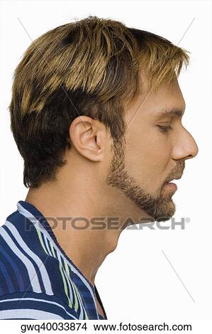 Side profile of a mid adult man thinking View Large Photo Image Picture - Side profile of a mid adult man thinking. Fotosearch