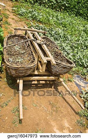 Stock Image - Agriculture equipments in a field, Zhigou, Shandong Province, China. Fotosearch