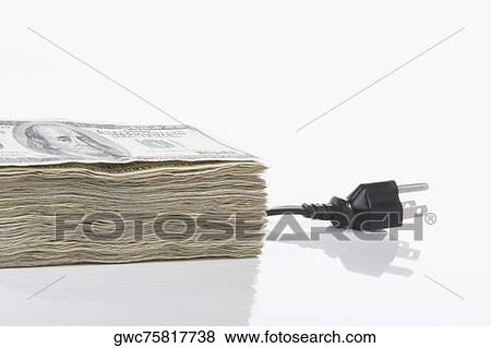 Bundle of US paper currency with a three pin plug View Large Photo Image Stock Photo - Bundle of US paper currency with a three pin plug. Fotosearch