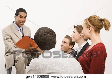 Business executives at a meeting in an office View Large Photo Image Stock Photography - Business executives at a meeting in an office. Fotosearch
