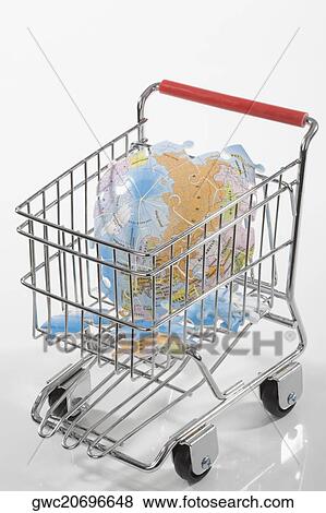Close-up of a broken globe in a shopping cart View Large Photo Image Stock Photo - Close-up of a broken globe in a shopping cart. Fotosearch