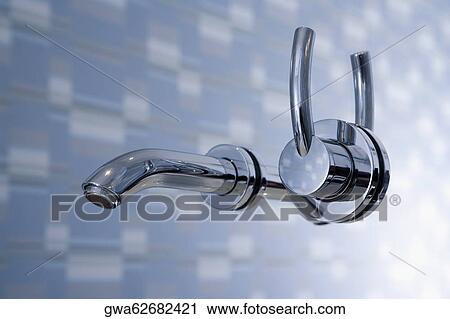 Close-up of a faucet in the bathroom View Large Photo Image Stock Image - Close-up of a faucet in the bathroom. Fotosearch