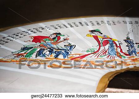 Stock Image - Close-up of a folding fan, Fuli Village, Yangshuo, Guangxi Province, China. Fotosearch