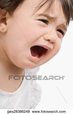 Close-up of a girl crying View Large Photo Image Stock Photo - Close-up of a girl crying. Fotosearch