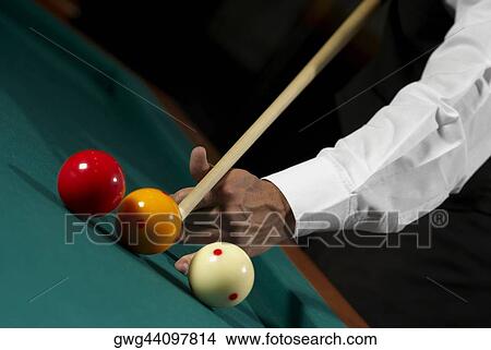 Close-up of a man's hand playing snooker View Large Photo Image Picture - Close-up of a man's hand playing snooker. Fotosearch