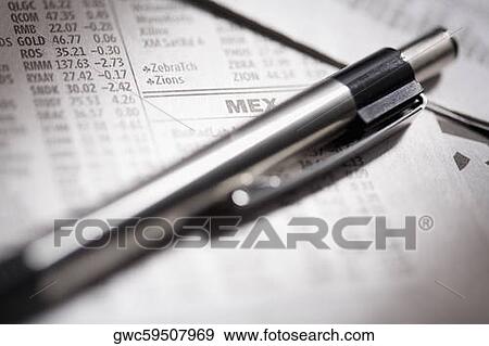 Close-up of a pen on financial newspapers View Large Photo Image Stock Photo - Close-up of a pen on financial newspapers. Fotosearch