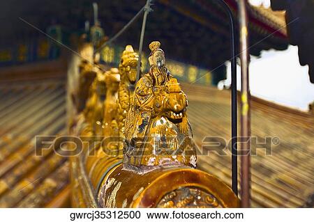 Close-up of a statue on the roof of a building, Tower Of Buddhist Incense, Summer Palace, Beijing, China View Large Photo Image Stock Image - Close-up of a statue on the roof of a building, Tower Of Buddhist Incense, Summer Palace, Beijing, China. Fotosearch