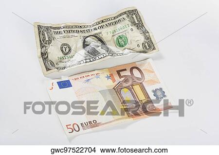 Close-up of a US dollar bill and fifty euro banknote View Large Photo Image Picture - Close-up of a US dollar bill and fifty euro banknote. Fotosearch