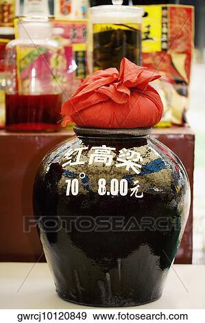Stock Photo - Close-up of a wine jar at a market stall, Tai'an, Shandong Province, China. Fotosearch