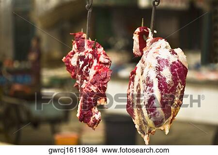 Close-up of beef hanging at a market stall, Tai'an, Shandong Province, China View Large Photo Image Picture - Close-up of beef hanging at a market stall, Tai'an, Shandong Province, China. Fotosearch