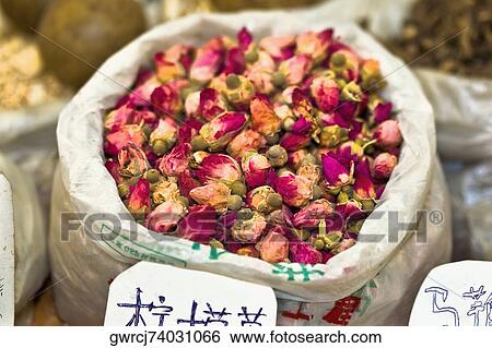 Close-up of dry roses at a market stall, Tai'an, Shandong Province, China View Large Photo Image Stock Photograph - Close-up of dry roses at a market stall, Tai'an, Shandong Province, China. Fotosearch