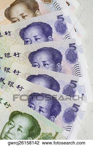 Stock Image - Close-up of five Yuan notes. Fotosearch
