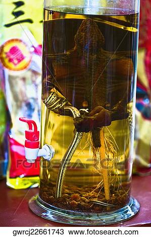 Stock Image - Close-up of ginseng in a bottle, Tai'an, Shandong Province, China. Fotosearch