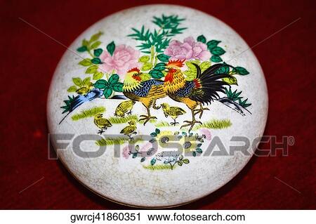 Stock Image - Close-up of paintings on a plate, Tai'an, Shandong Province, China. Fotosearch