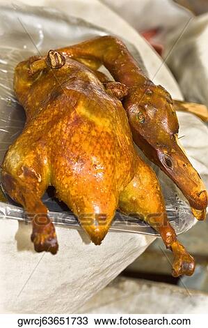 Close-up of roasted duck on a tray, Zhigou, Shandong Province, China View Large Photo Image Stock Image - Close-up of roasted duck on a tray, Zhigou, Shandong Province, China. Fotosearch