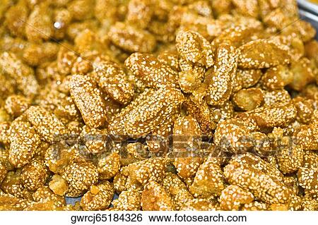 Stock Photograph - Close-up of sesame candies, Zhigou, Shandong Province, China. Fotosearch