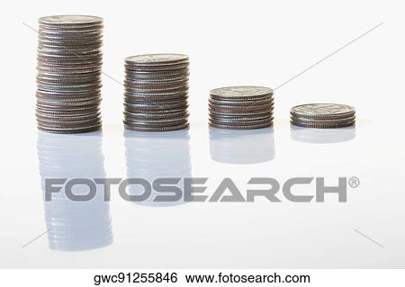 Stock Photograph - Close-up of stacks of coins. Fotosearch