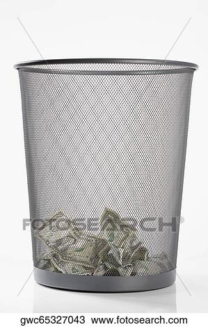 Close-up of US dollar bills in a garbage bin View Large Photo Image Stock Image - Close-up of US dollar bills in a garbage bin. Fotosearch