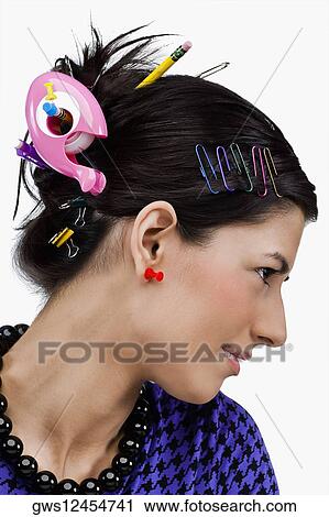 Close-up of various office supply items in a young woman's hair View Large Photo Image Stock Image - Close-up of various office supply items in a young woman's hair. Fotosearch