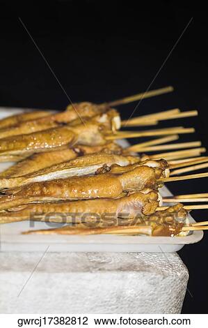 Duck meat on skewers, Nanjing, Jiangsu Province, China View Large Photo Image Stock Image - Duck meat on skewers, Nanjing, Jiangsu Province, China. Fotosearch