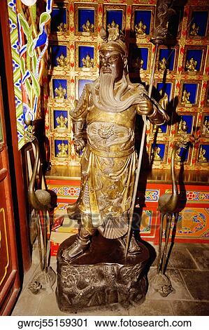 Stock Image - Guang Giong statue in a temple, Da Zhao Temple, Hohhot, Inner Mongolia, China. Fotosearch